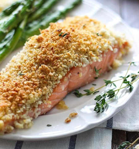 Parmesan crusted salmon plated with asparagus